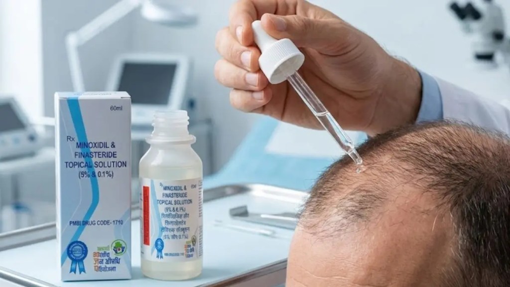 Person applying Pradhan Mantri Minoxidil topical solution on the scalp using a dropper under medical guidance